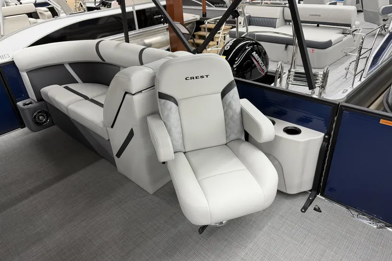 Slide: The Image of 2025 Crest Classic 200 boat interior with luxurious seating and modern design. - 6