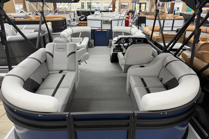Slide: The Image of 2025 Crest Classic 200 pontoon boat interior with luxurious seating and modern design. - 9