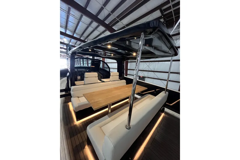 Slide: The Image of Luxurious 2018 Alen 45 yacht interior with elegant seating and wooden table. - 13