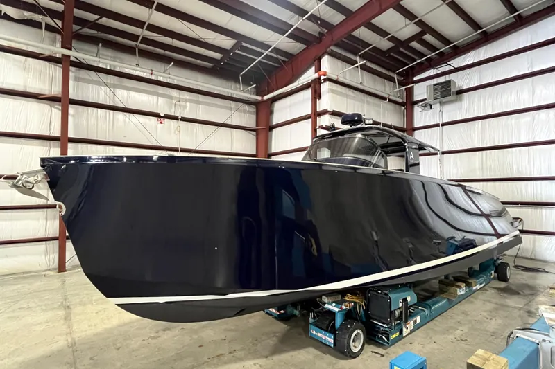 Slide: The Image of Sleek 2018 Alen 45 yacht in a spacious indoor storage facility. - 2