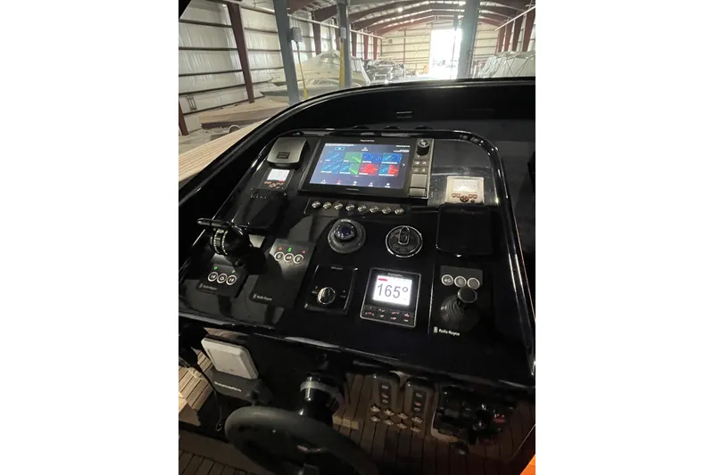 Slide: The Image of Control panel of a 2018 Alen 45 boat with navigation and monitoring systems. - 26