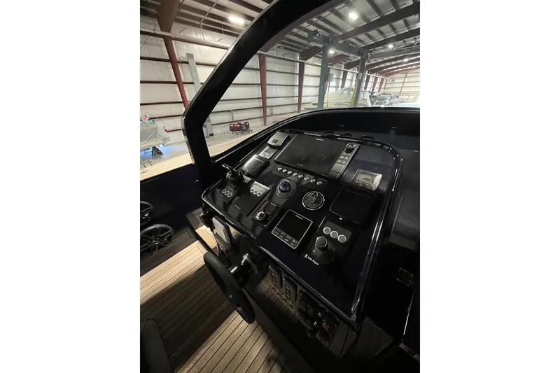 Slide: The Image of Control panel of a 2018 Alen 45 yacht in a warehouse setting. - 27