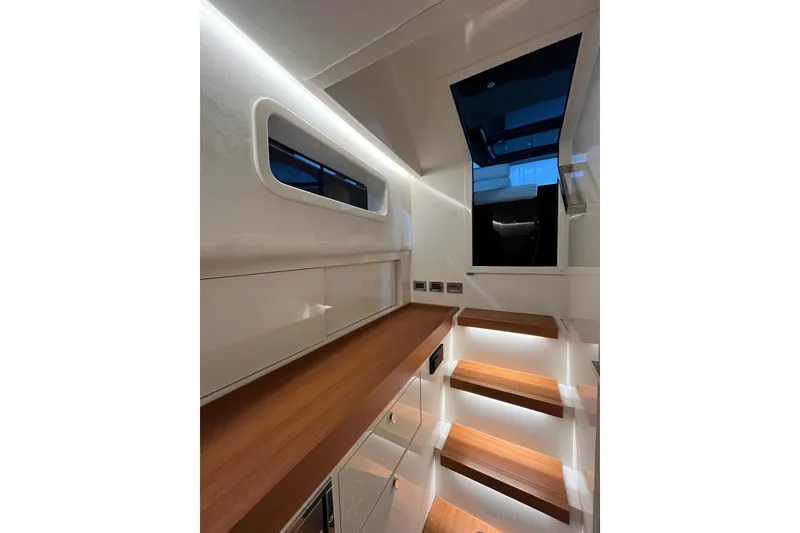Slide: The Image of Luxurious interior of 2018 Alen 45 yacht with wooden steps and modern lighting. - 30