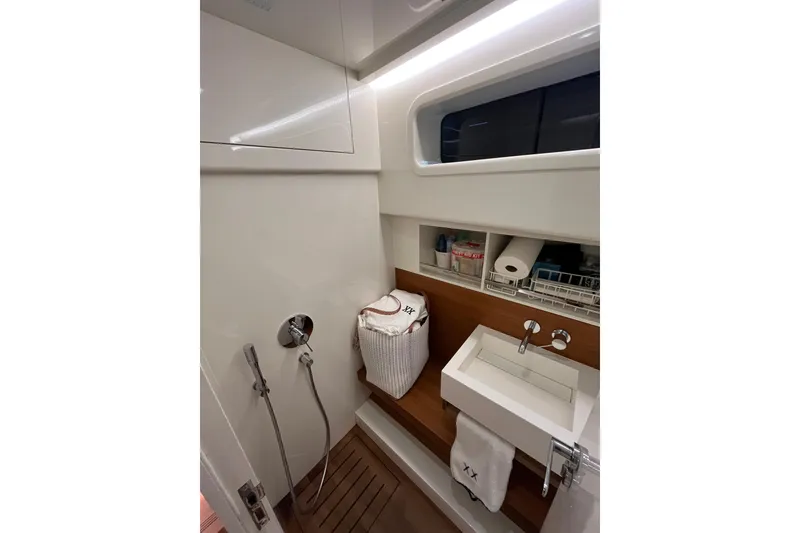Slide: The Image of Compact bathroom in 2018 Alen 45 yacht with modern fixtures and storage. - 33