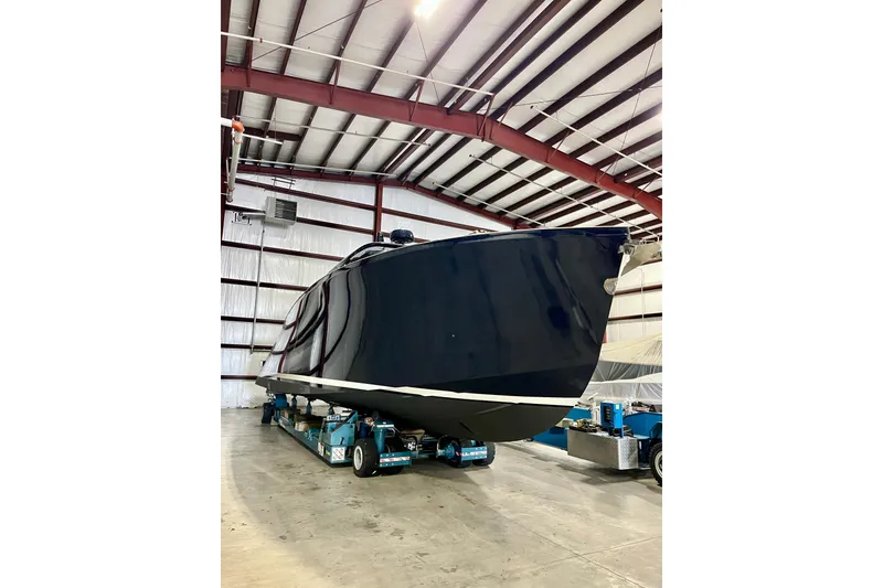 Slide: The Image of 2018 Alen 45 yacht in a spacious indoor storage facility. - 4