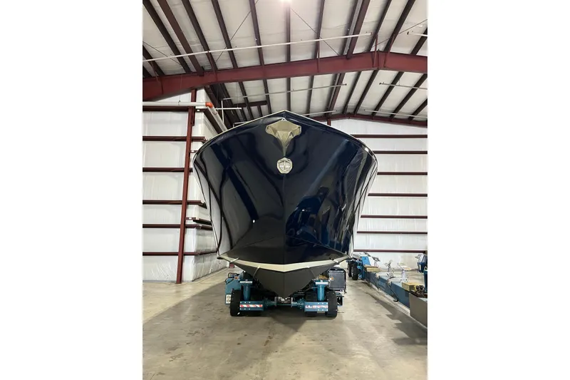 Slide: The Image of 2018 Alen 45 boat in a warehouse, front view. - 6
