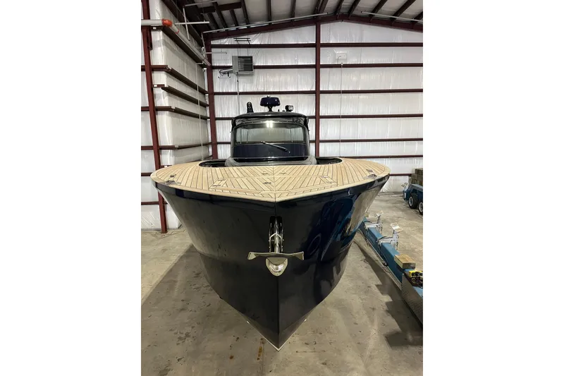 Slide: The Image of Luxury Alen 45 yacht, 2018 model, docked in a spacious indoor facility. - 7