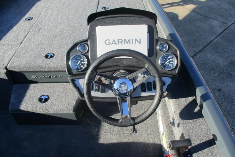 Slide: The Image of 2026 Ranger RT188P boat dashboard with Garmin display and steering wheel. - 4