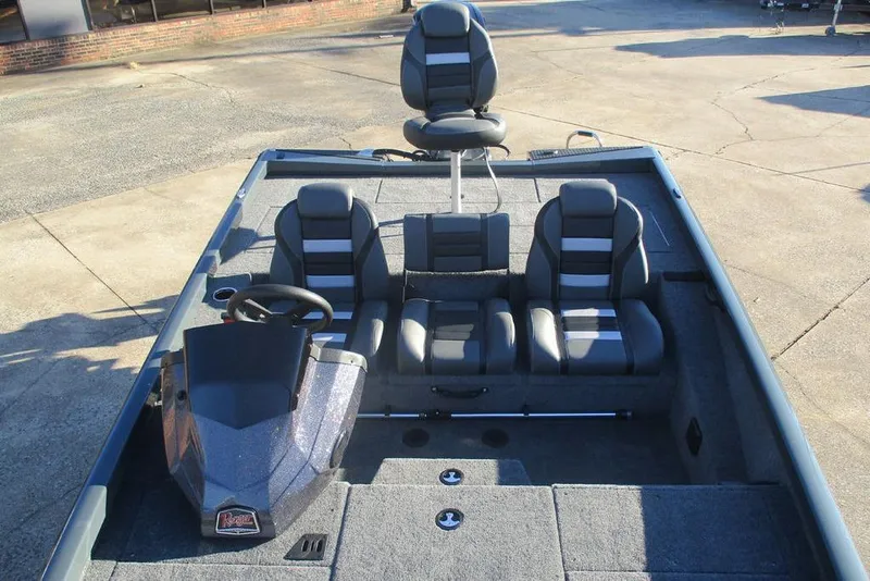 Slide: The Image of 2026 Ranger RT188P boat interior with seating and steering console. - 9
