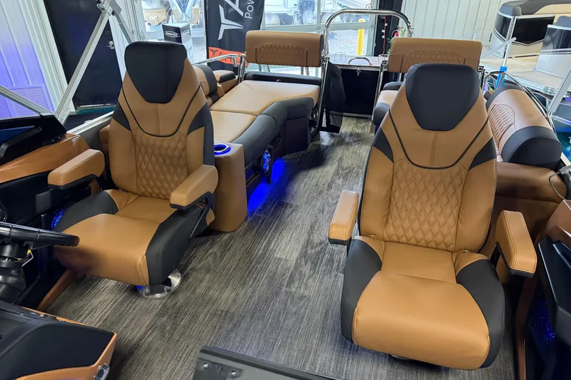 Slide: The Image of 2026 Tahoe Pontoon Cascade Quad Lounger interior with luxurious seating and ambient lighting. - 4