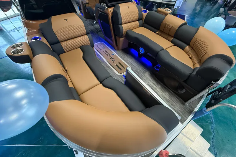 Slide: The Image of 2026 Tahoe Pontoon Cascade Quad Lounger with luxurious seating and ambient lighting. - 6