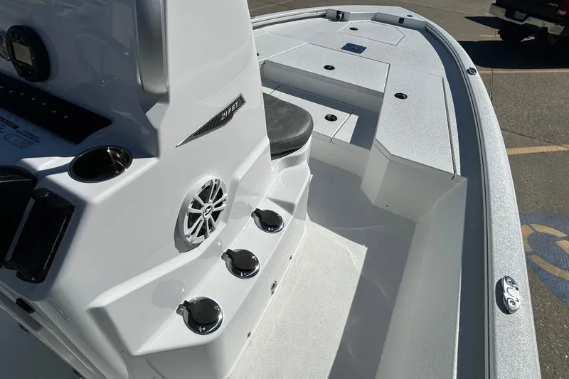 Slide: The Image of 2026 Avid 21 FST boat interior with seating and control panel. - 12