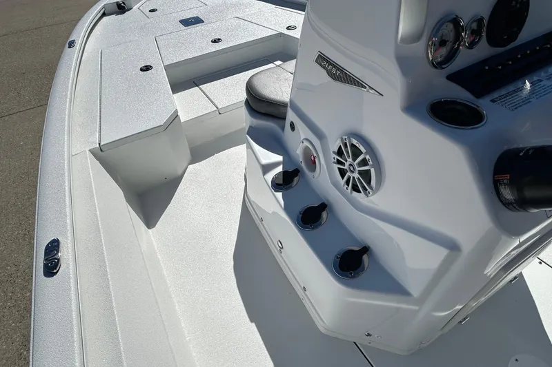 Slide: The Image of 2026 Avid 21 FST boat interior with control panel and seating. - 13