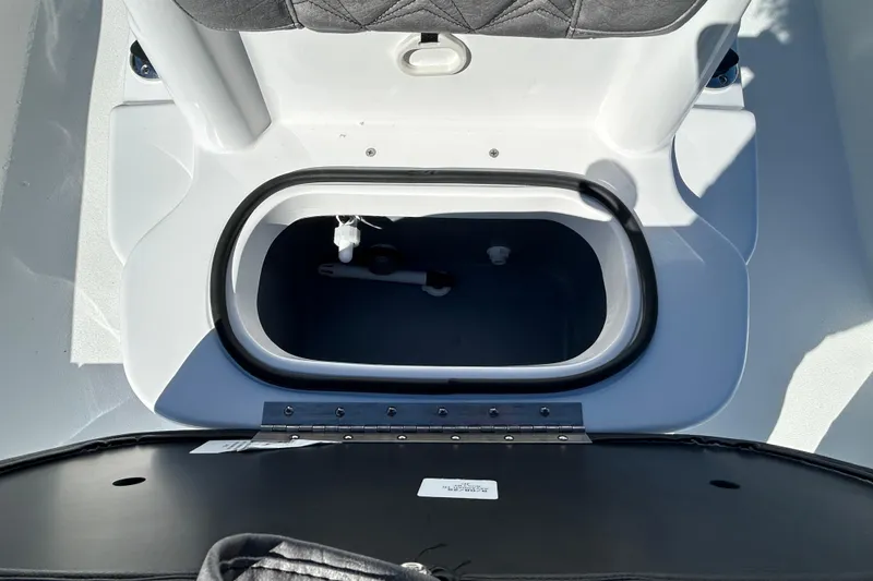 Slide: The Image of Livewell compartment in 2026 Avid 21 FST boat, featuring a sleek design. - 17