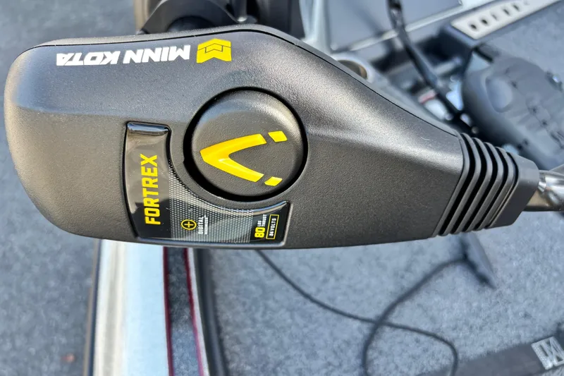 Slide: The Image of Minn Kota Fortrex trolling motor on 2024 Triton 18 TrX boat. - 2