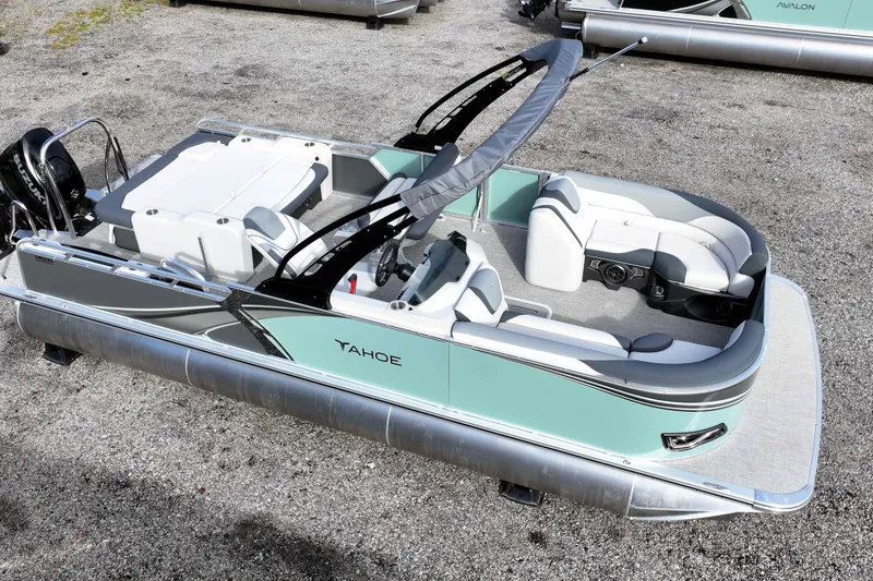Slide: The Image of 2026 Tahoe Pontoon LTZ Entertainer boat with sleek design and spacious seating. - 10