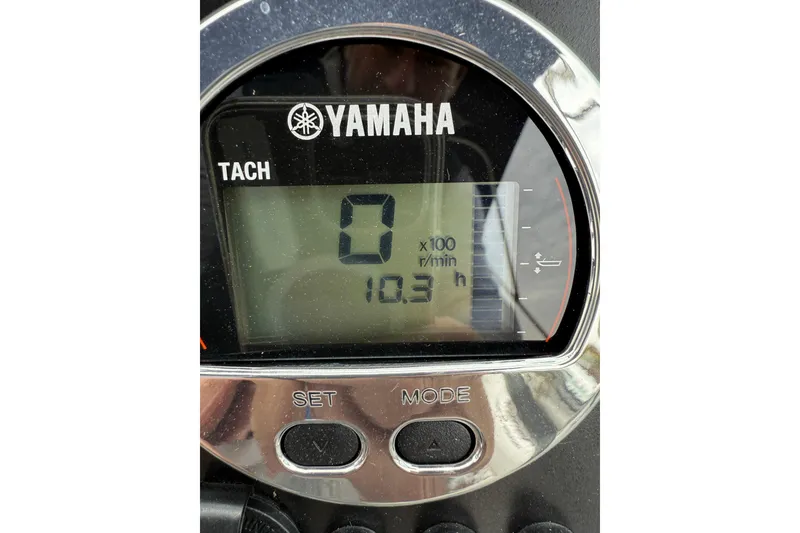 Slide: The Image of Yamaha tachometer display on 2025 Robalo R207 Dual Console boat, showing 10.3 hours. - 8