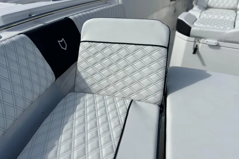 Slide: The Image of Luxurious seating on 2026 Sea Fox 368 Commander boat with diamond-stitched upholstery. - 13