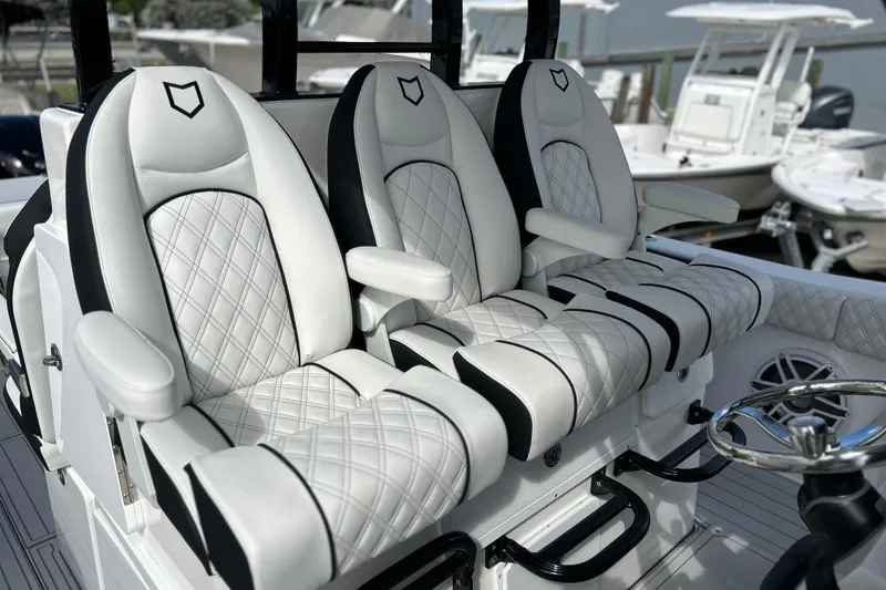 Slide: The Image of Luxurious seating on 2026 Sea Fox 368 Commander boat, featuring diamond-stitched upholstery. - 14