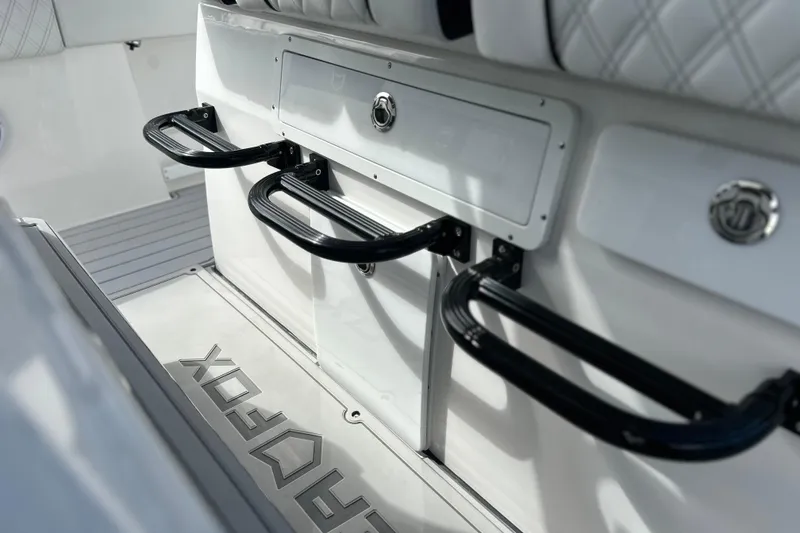 Slide: The Image of 2026 Sea Fox 368 Commander interior with black handles and diamond-stitched seating. - 16