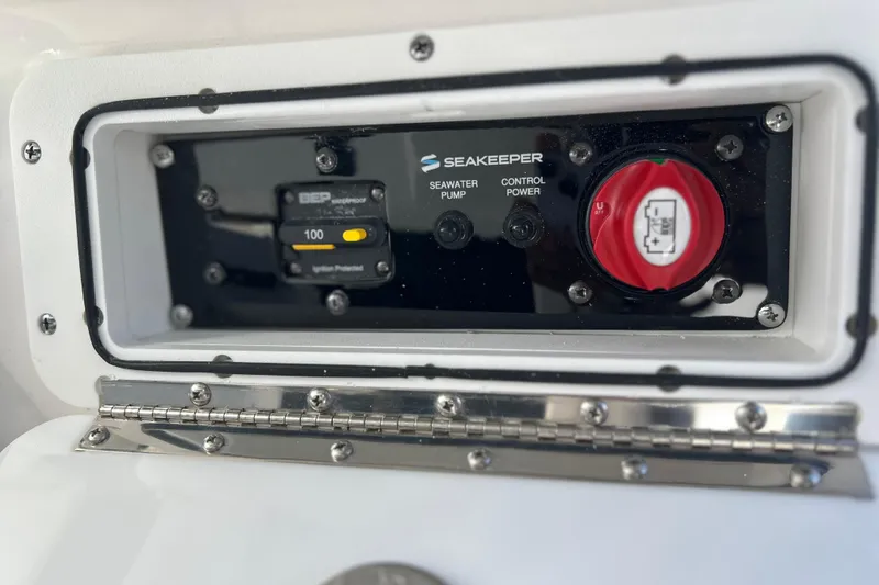 Slide: The Image of Control panel of 2026 Sea Fox 368 Commander with Seakeeper system and power switch. - 18