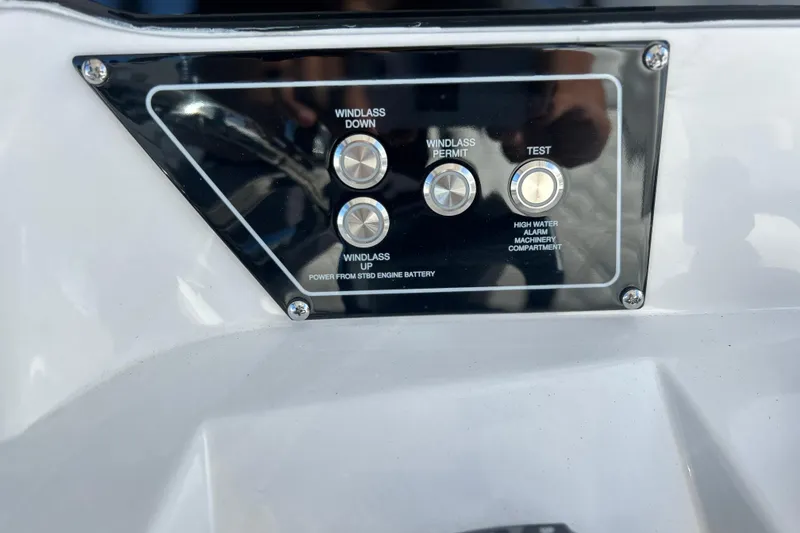 Slide: The Image of Control panel on 2026 Sea Fox 368 Commander boat with windlass and alarm buttons. - 25