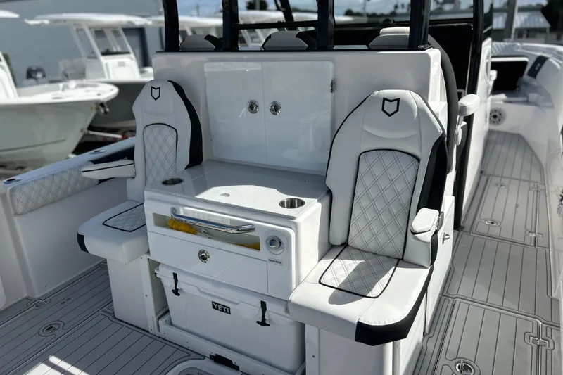 Slide: The Image of 2026 Sea Fox 368 Commander boat interior with luxury seating and storage. - 38