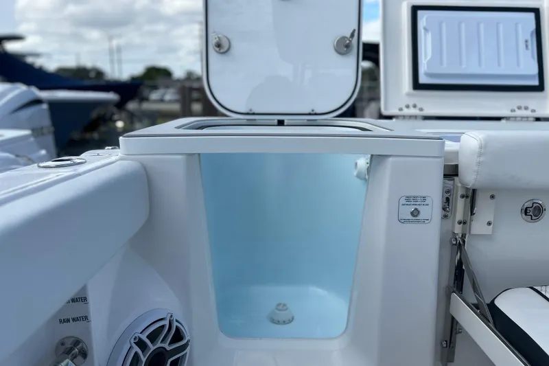 Slide: The Image of Sea Fox 368 Commander 2026 boat interior, featuring a storage compartment and seating area. - 50