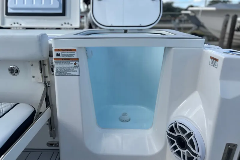 Slide: The Image of Sea Fox 368 Commander 2026 boat interior with storage compartment and speaker. - 52
