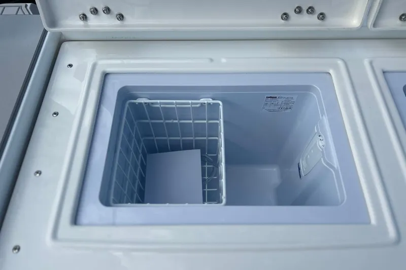 Slide: The Image of Built-in cooler compartment on 2026 Sea Fox 368 Commander boat. - 55