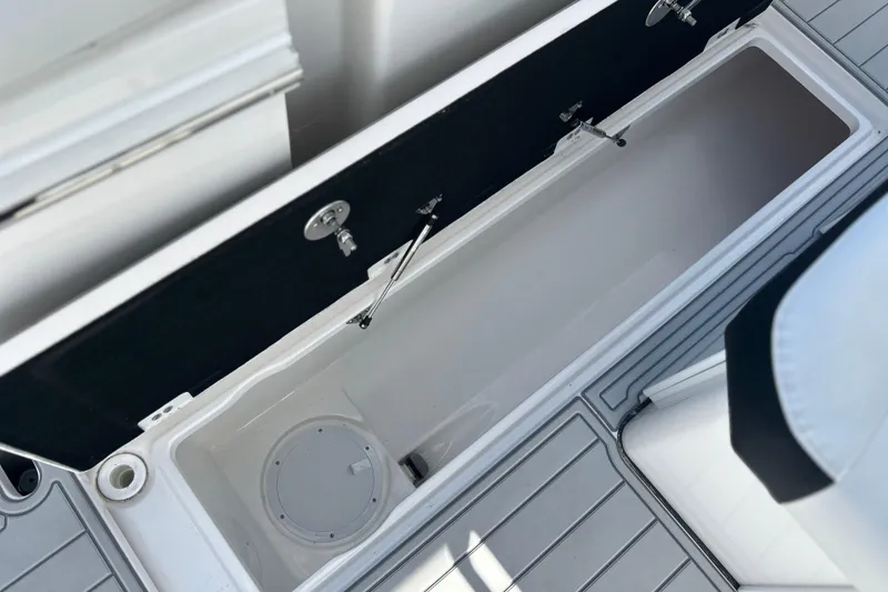 Slide: The Image of Open storage compartment on 2026 Sea Fox 368 Commander boat deck. - 60