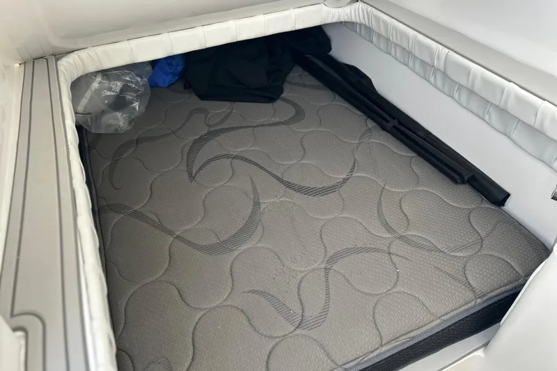 Slide: The Image of 2026 Sea Fox 368 Commander cabin interior with cushioned sleeping area. - 66