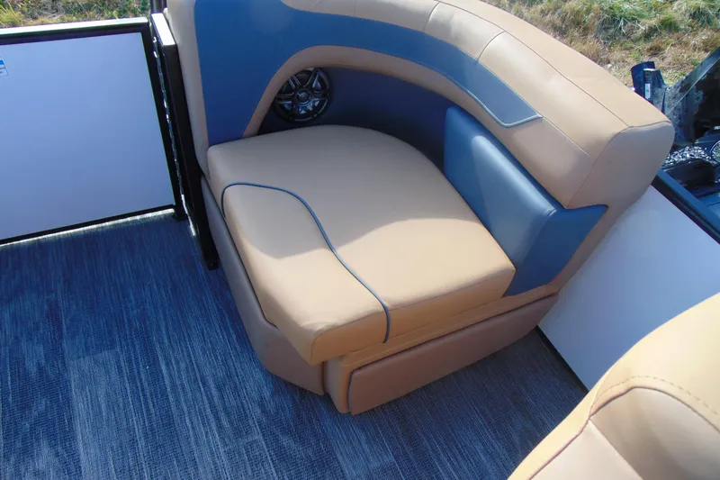 Slide: The Image of 2026 Godfrey Sweetwater 2486 QS iMPACT Package boat seating, beige and blue upholstery. - 21