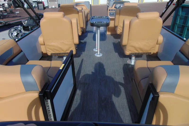 Slide: The Image of Interior of 2026 Godfrey Sweetwater 2486 QS iMPACT pontoon boat with tan seating. - 23