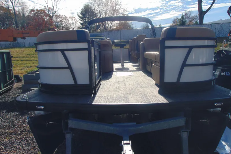 Slide: The Image of 2026 Godfrey Sweetwater 2486 QS iMPACT pontoon boat with spacious deck and seating. - 3