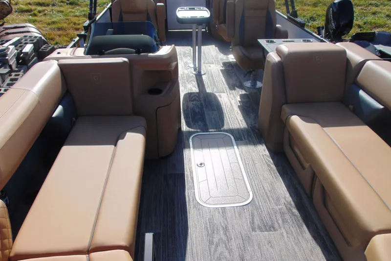Slide: The Image of Interior of 2026 Godfrey Sweetwater 2486 QS iMPACT pontoon boat with tan seating. - 4