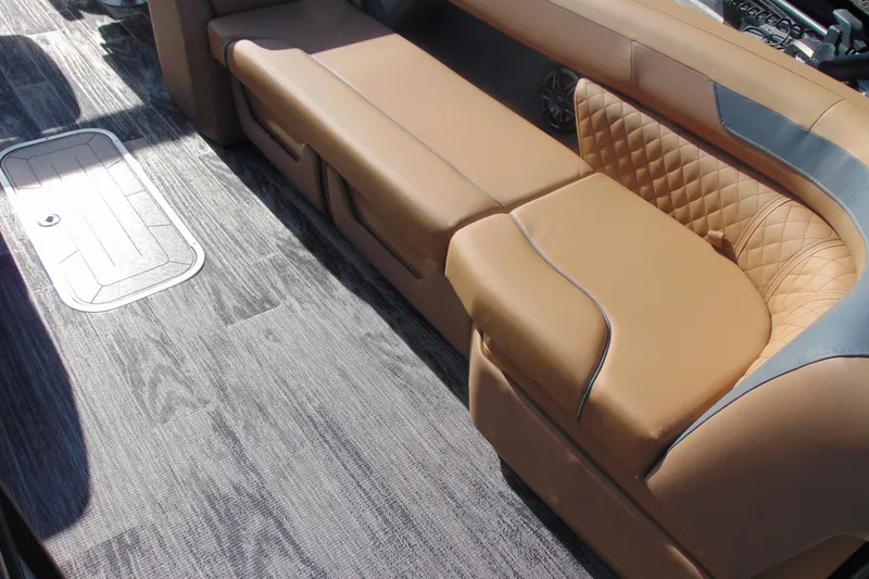 Slide: The Image of Luxurious tan seating on 2026 Godfrey Sweetwater 2486 QS iMPACT pontoon boat. - 5