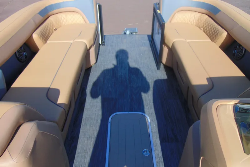 Slide: The Image of Interior of 2026 Godfrey Sweetwater 2486 QS iMPACT pontoon boat with tan seating. - 8