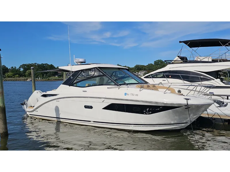 Slide: The Image of Sea Ray 320 SUNDANCER COUPE OB 2026 - 55