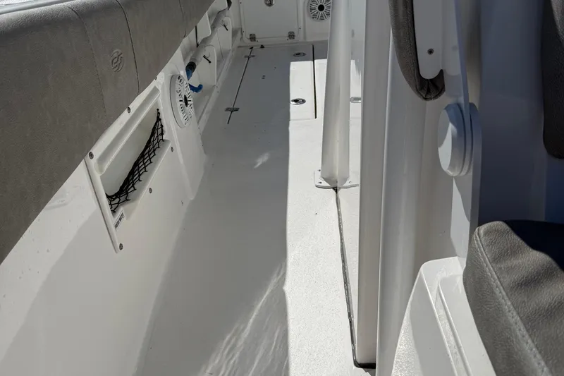 Slide: The Image of Interior view of 2021 Sea Fox 268 Commander boat, featuring seating and storage compartments. - 29