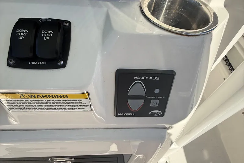 Slide: The Image of Control panel of a 2021 Sea Fox 268 Commander boat with trim tabs and windlass controls. - 38