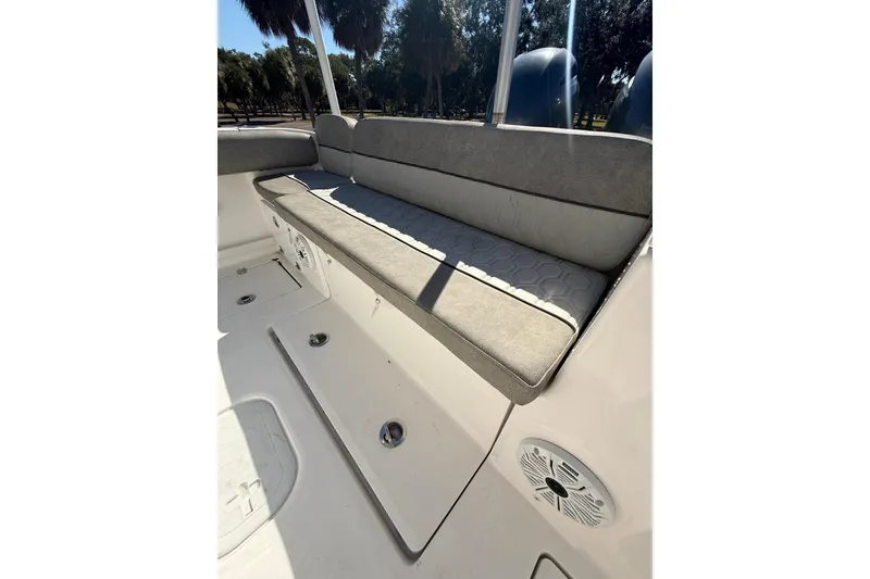 Slide: The Image of 2021 Sea Fox 268 Commander boat interior with cushioned seating and speaker. - 41