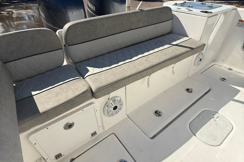 Slide: The Image of 2021 Sea Fox 268 Commander boat interior with cushioned seating and storage compartments. - 49