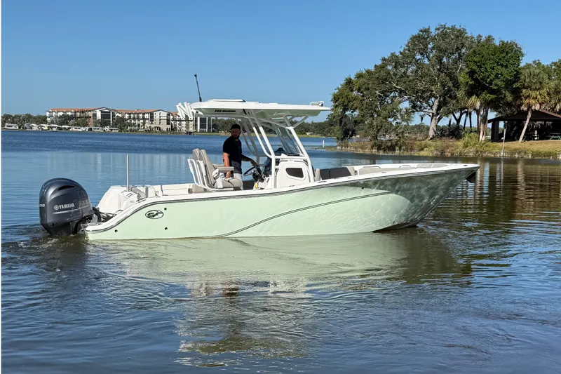 Slide: The Image of 2021 Sea Fox 268 Commander boat on calm water with Yamaha engine. - 5