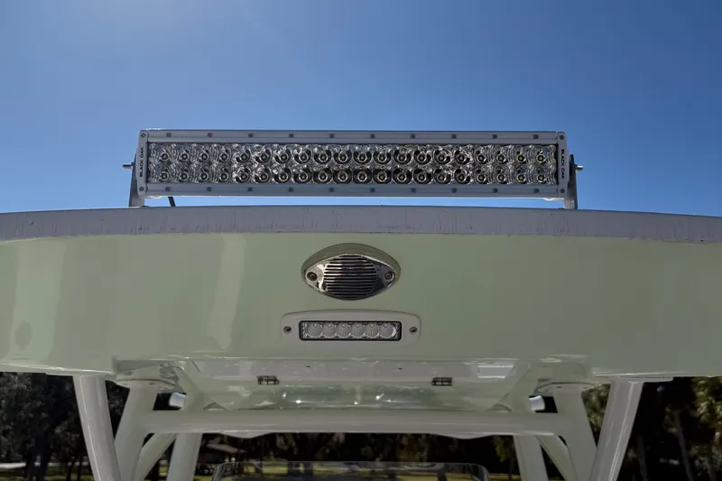 Slide: The Image of 2021 Sea Fox 268 Commander boat with LED light bar under clear blue sky. - 55