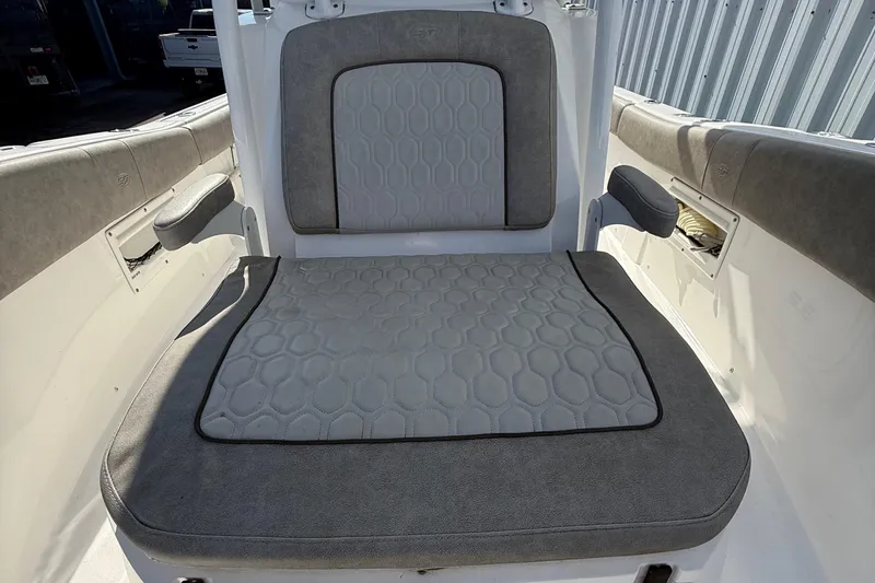 Slide: The Image of 2021 Sea Fox 268 Commander boat interior with cushioned seating and storage compartments. - 57