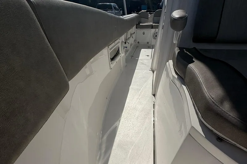 Slide: The Image of 2021 Sea Fox 268 Commander boat interior with cushioned seating and sleek design. - 59