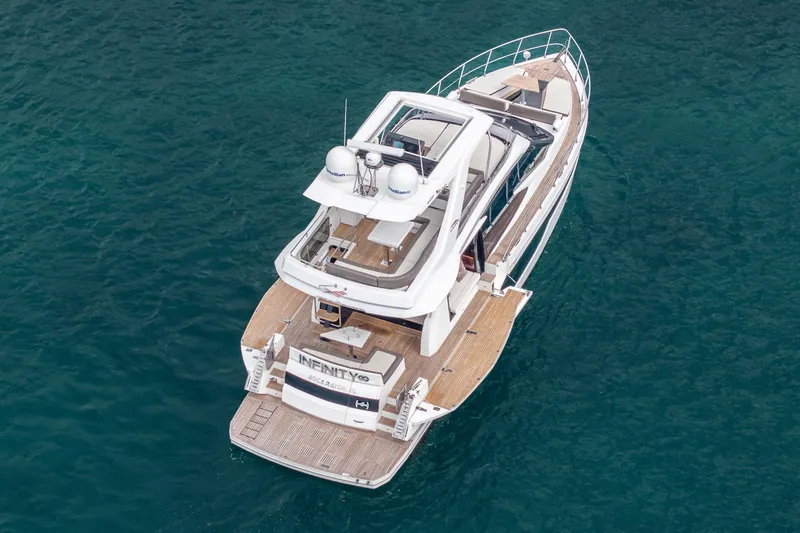 Slide: The Image of Aerial view of 2020 Galeon 500 Fly yacht on clear blue water. - 3