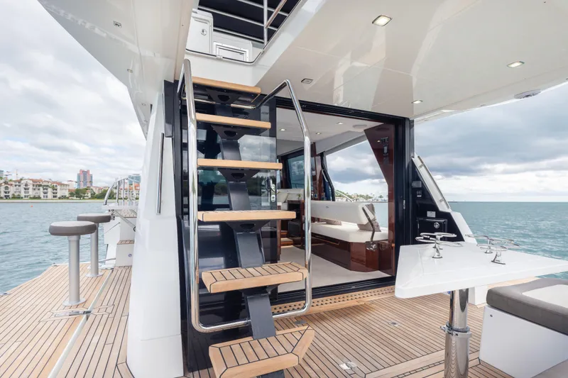 Slide: The Image of Luxury Galeon 500 Fly yacht deck with modern seating and ocean view, 2020 model. - 31