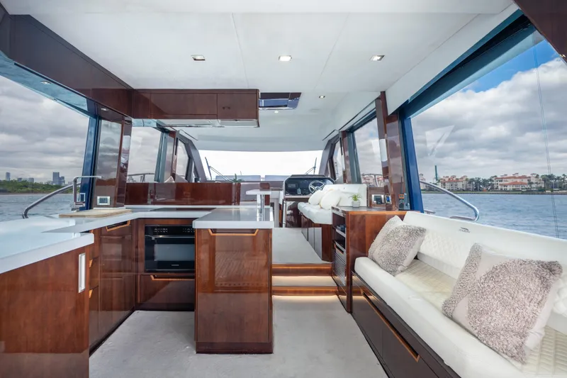 Slide: The Image of Luxurious interior of 2020 Galeon 500 Fly yacht with modern kitchen and seating area. - 33